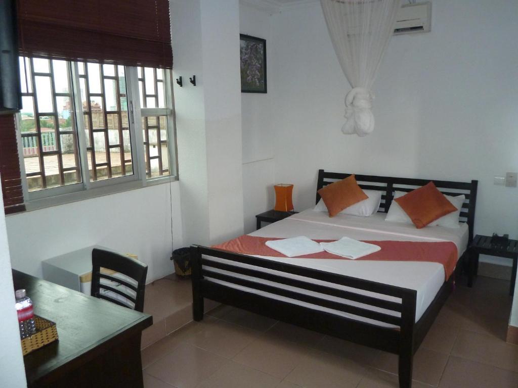 Cyclo Hotel-Bar-Restaurant Phnom Penh Rom bilde